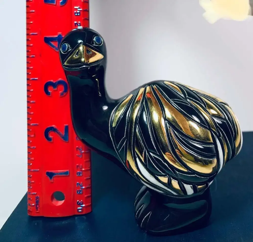 Emu or Ostrich black and gold figurine